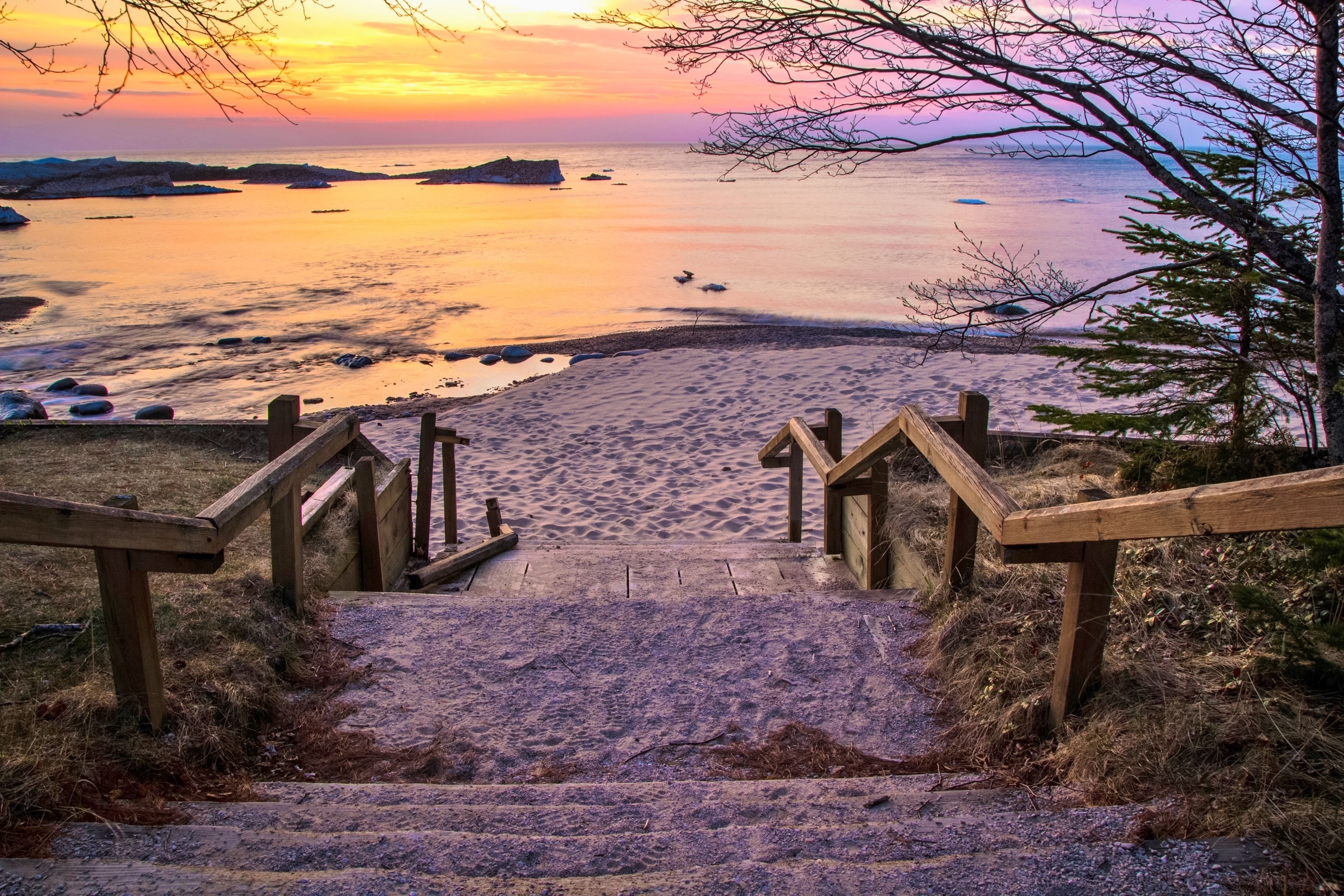 Lake Superior Sunset. Stairs leading to a beautiful Lake Superior sunset beach at the Hurricane River Campground in Pictured Rocks National Lakeshore.