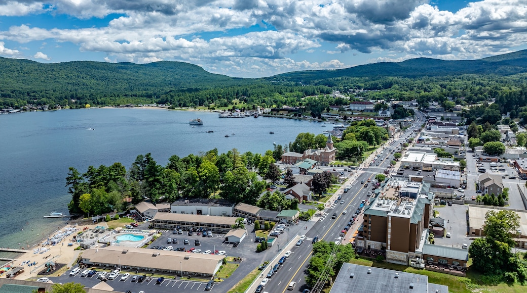 July 21, 2025 - Lake George, NY, USA. Sunny afternoon summer aerial image of the south end of Lake George and Canada Street, Lake George, NY, USA.