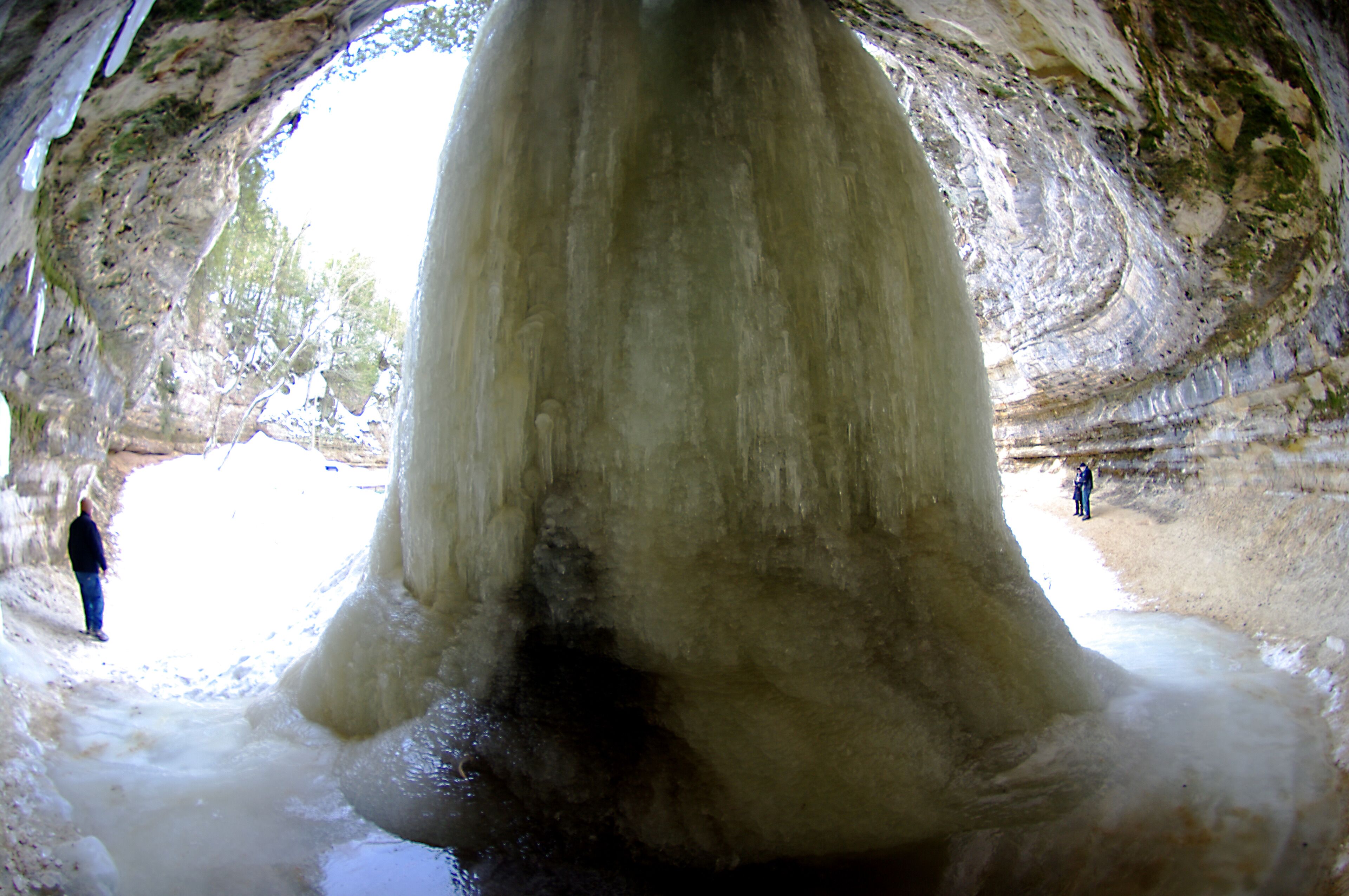While the outside of the falls were frozen solid the water was still running through the core.  Really cool effect to watch.