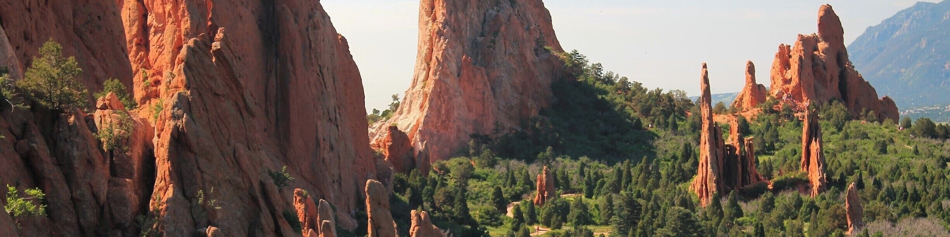 This is a view from the far side of the rock formations at Garden of the Gods. There are foot paths that circle these formations and wind through them. You can also rent Segways to tour the area. The paths are paved and are handicap accessible so everyone can enjoy the spectacular scenery and the magnificent red rock formations. Oh, and there are jeep tours as well! #GardenOfTheGods #ColoradoSprings #Colorado #RockFormations #colorful #EndlessSummer #Green #Perspectives