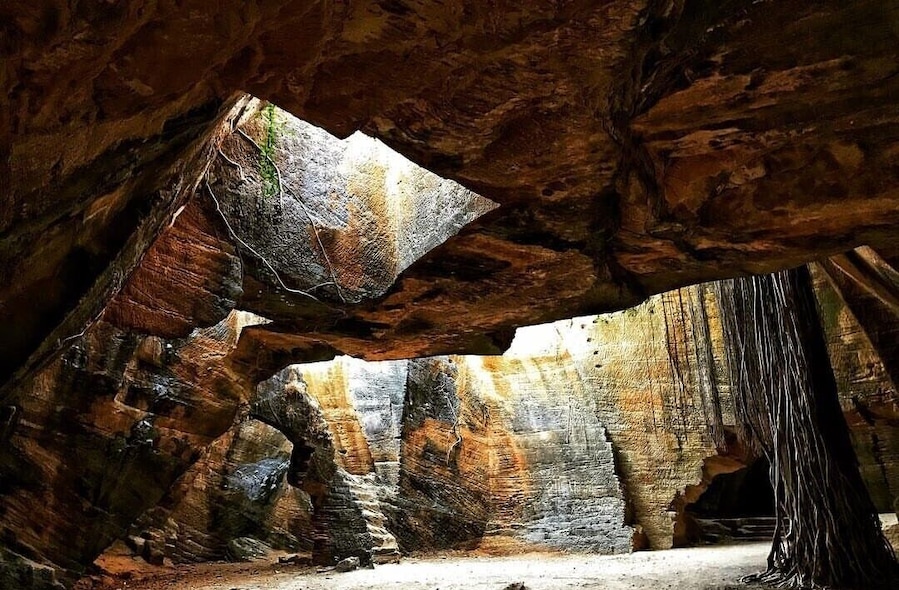 The Naida Caves in Diu
Naida caves are located close to the Diu Fort, behind the Arabian Sea. Many individuals say that these are man-made caves while others believe it to be a natural one.
When the Portuguese ruled Diu, Diu Fort was their main colonial headquarters. It is believed that Portuguese while erecting the fort seized building materials from these caves which resulted in the troughs and crests of the cavern. Long after the Portuguese left the domicile, the caves were subjected to natural wear and tear which bequeathed the caves its present shape. The caves start at a much lower distance from ground level.
Diu is one of the finest destinations in India. Though lesser explored as compared to several travel destinations in India, Diu boasts of forts, churches, temples and clean beaches. This Union Territory was ruled by the Portuguese for over four centuries and has an evident influence of the colonizers in everything from language to food and architecture to culture.