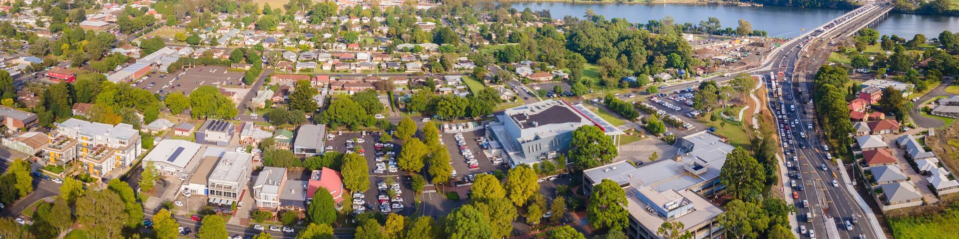 Panoramic aerial drone view of Nowra showing Nowra Bridge along the Princes Highway in the City of Shoalhaven, NSW, Australia with Shoalhaven River in the background