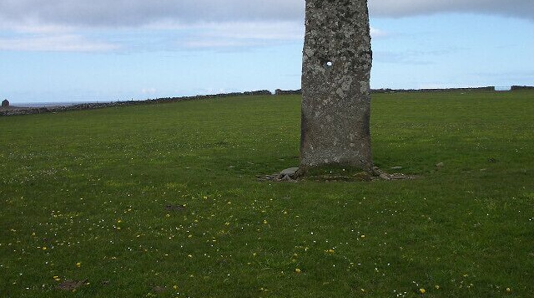 Standing stone on North Ronaldsay. The hole through the centre of the stone can be seen clearly here.