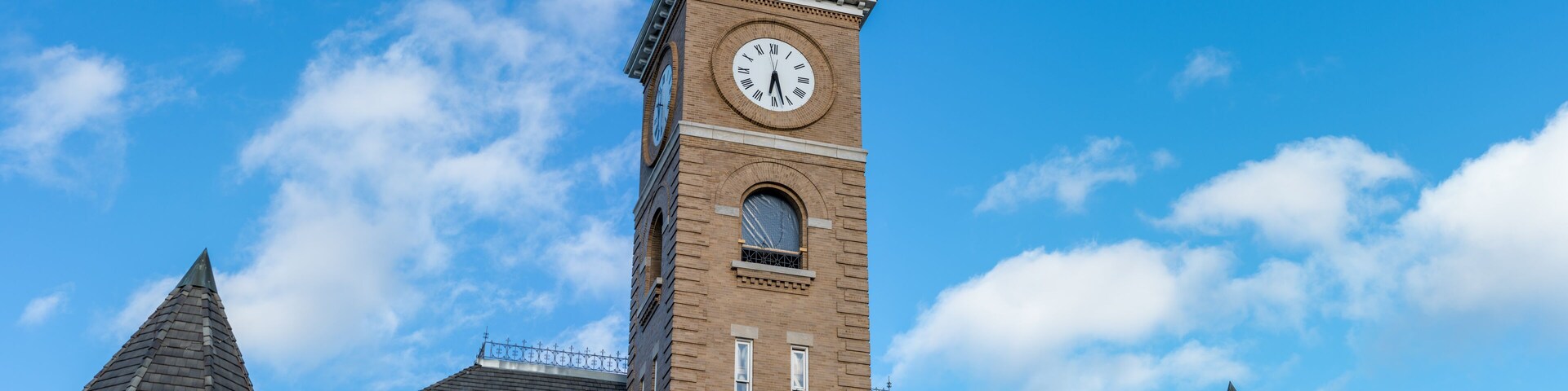 Historic Washington County Courthouse building in Fayetteville Arkansas, college ave, sunny summer day view