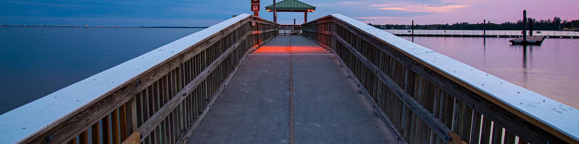North Fort Myers which includes a sunset, a bay or harbor and a bridge
