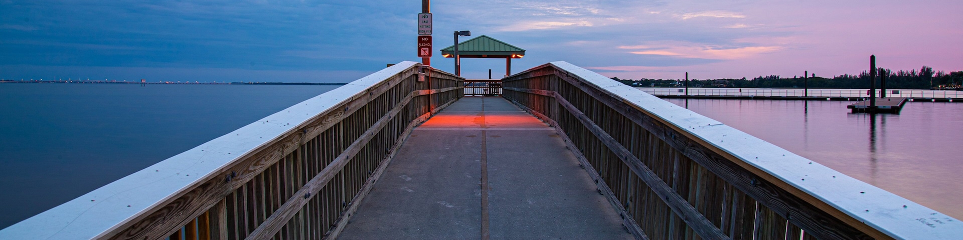 North Fort Myers which includes a sunset, a bay or harbor and a bridge
