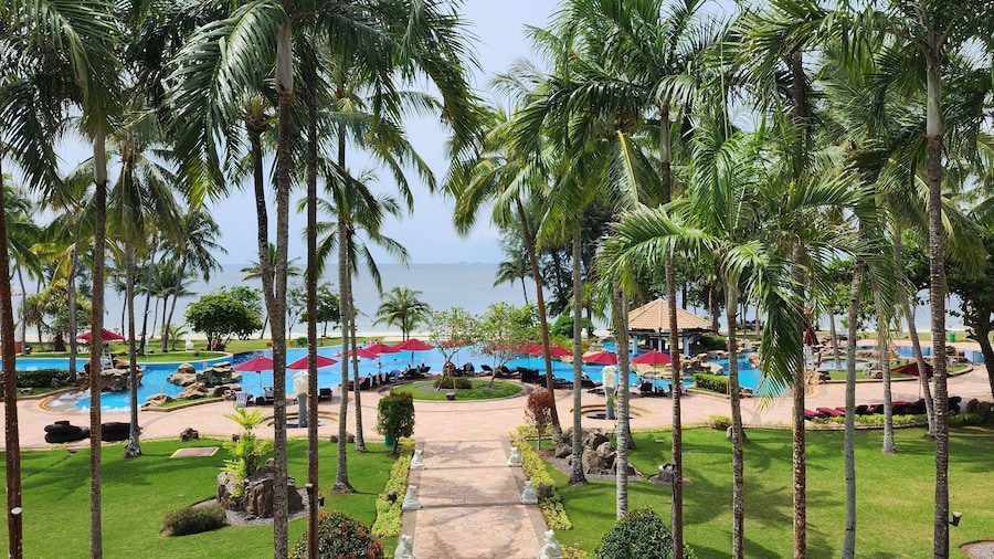 Tropical beach with palm trees at Bintan Island, Indonesia