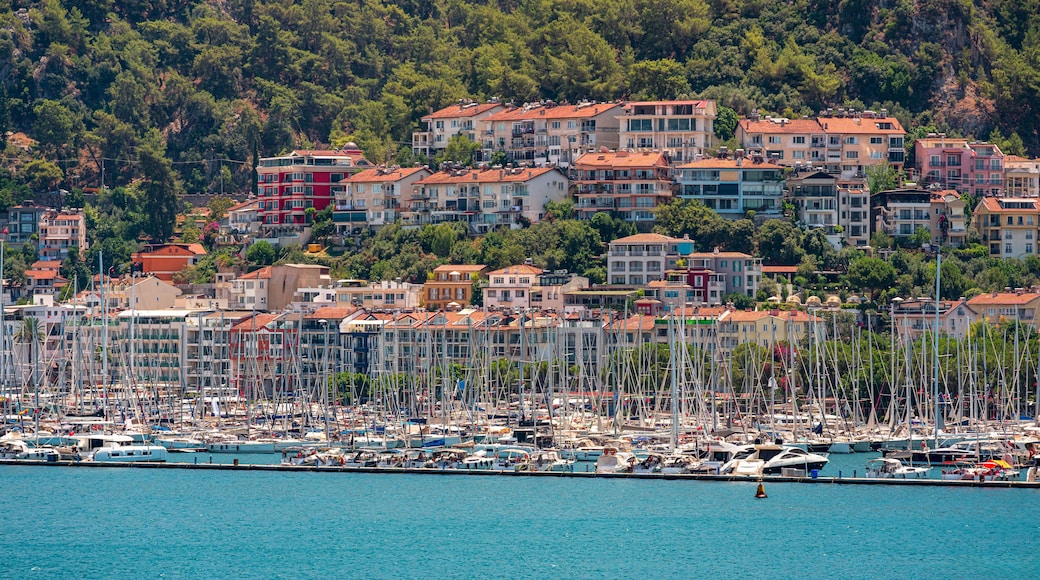Panoramic view of colorful beach houses and a marina filled with yachts in Fethiye, Turkey