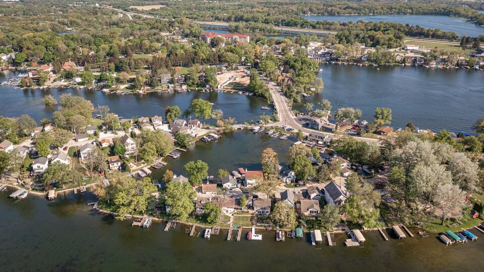 Oconomowoc, WI USA - May 17, 2021: Aerial view of Okauchee Lake
