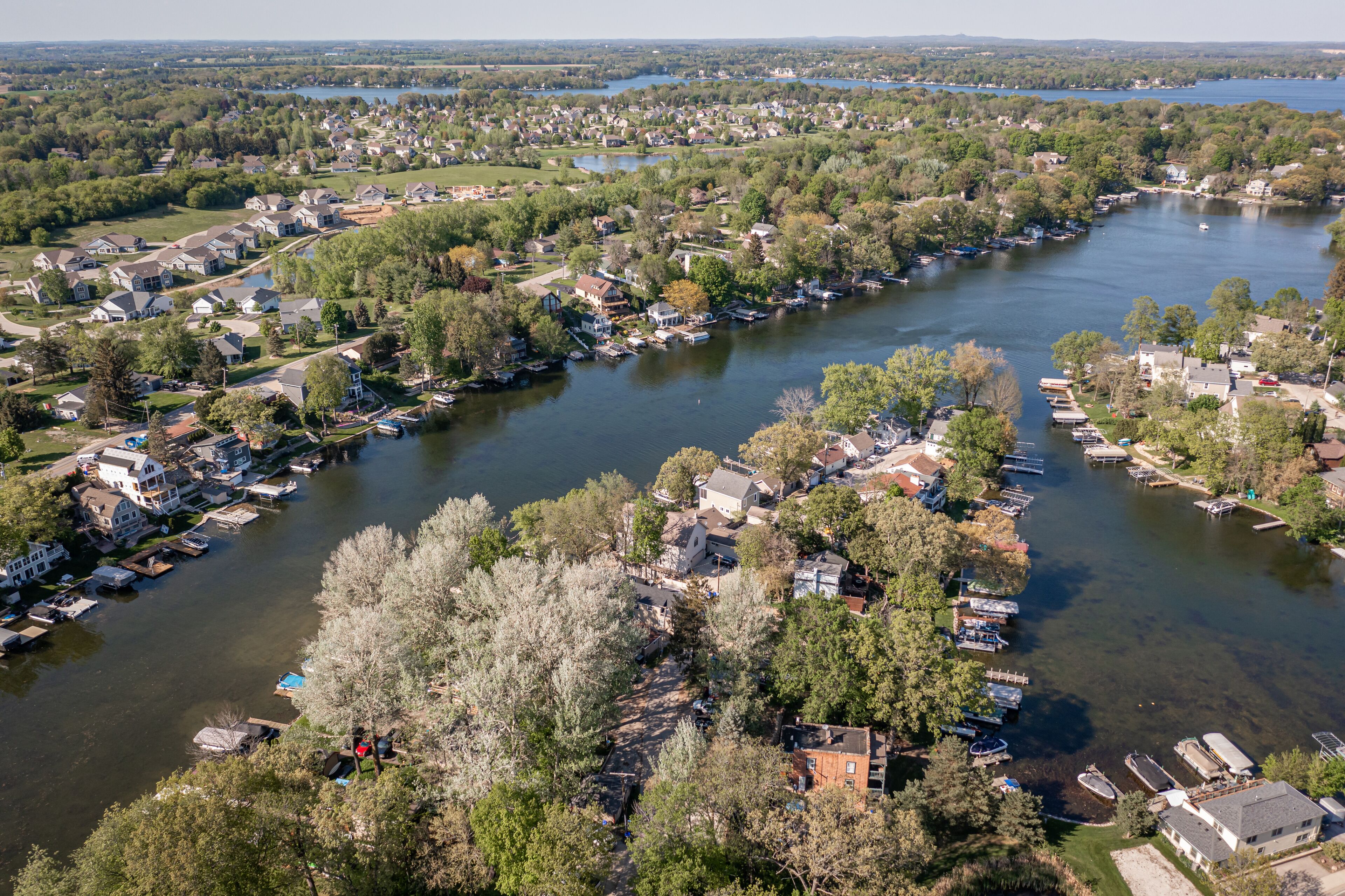 Oconomowoc, WI USA - May 17, 2021: Aerial view of Okauchee Lake area