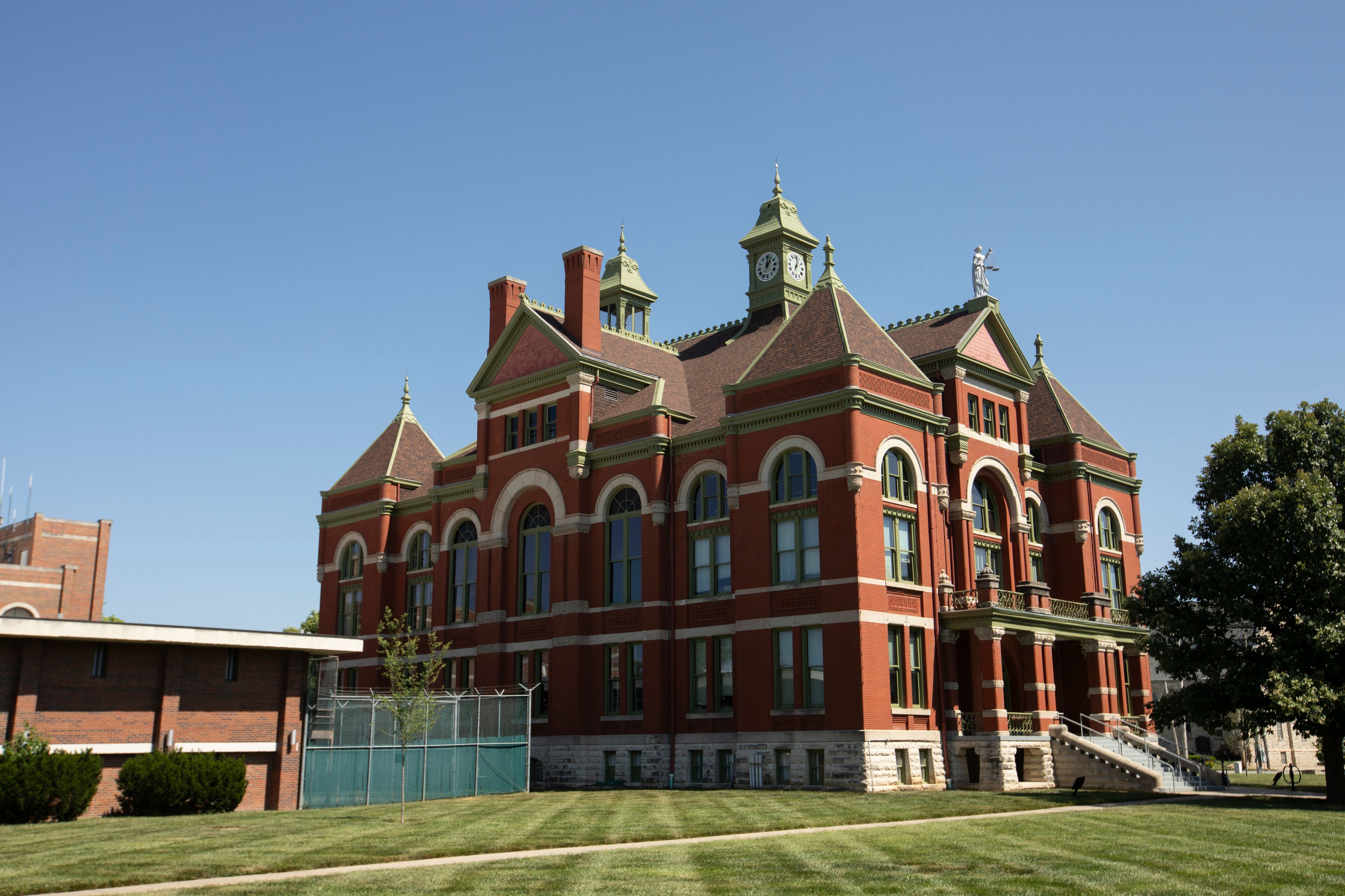 Afternoon sun shines on the historic 19th Century Franklin County Courthouse in downtown Ottawa, Kansas, USA.
