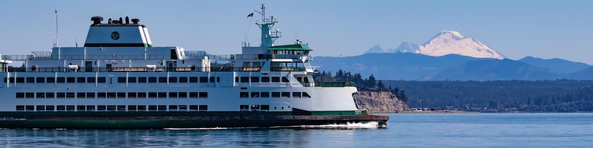 Washington State Ferry on Clinton-Mukilteo Route Passes Mount Baker and South Tip of Hat Island