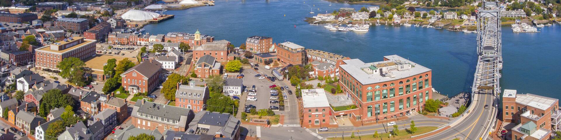 Portsmouth historic city center and Waterfront of Piscataqua River with Memorial Bridge aerial view, New Hampshire, NH, USA.
