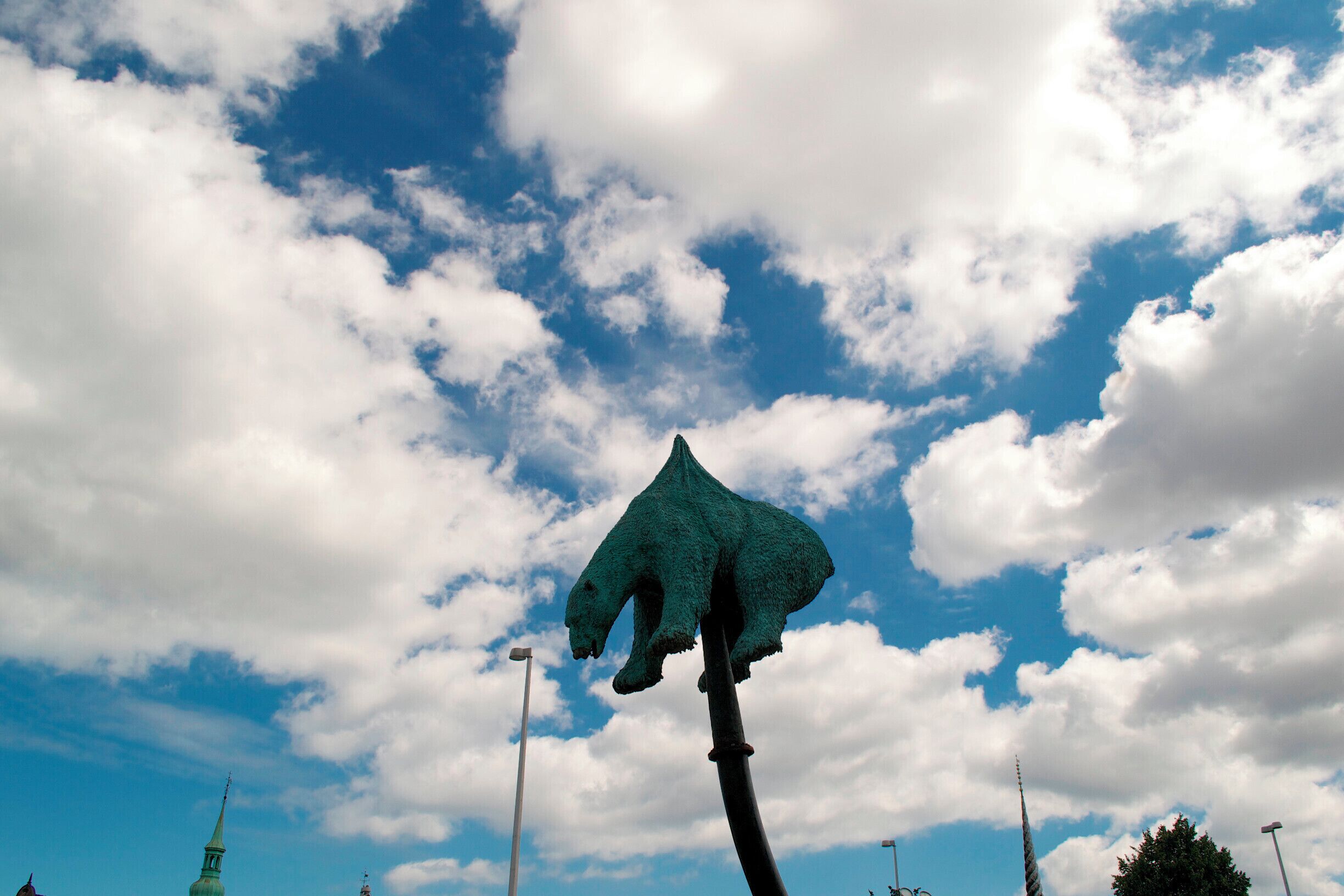 Interesting statue at christiansborg slot.

Some internet sleuthing tells me it was placed there to urge the government to do more about climate change. The curve of the oil pipeline on which the polar bear is impaled represents the the curve of the world's CO2 emission.