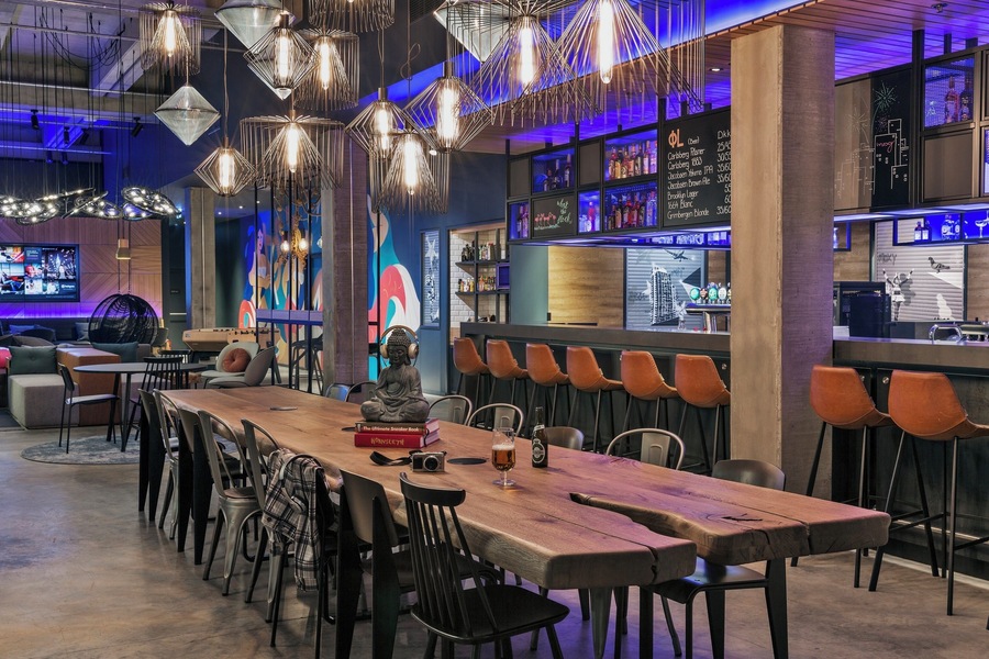 Cool hotel bar. Comfortable hotel with nice rooms and hostel vibes in the common areas. Located just outside city center with easy public transport access.
