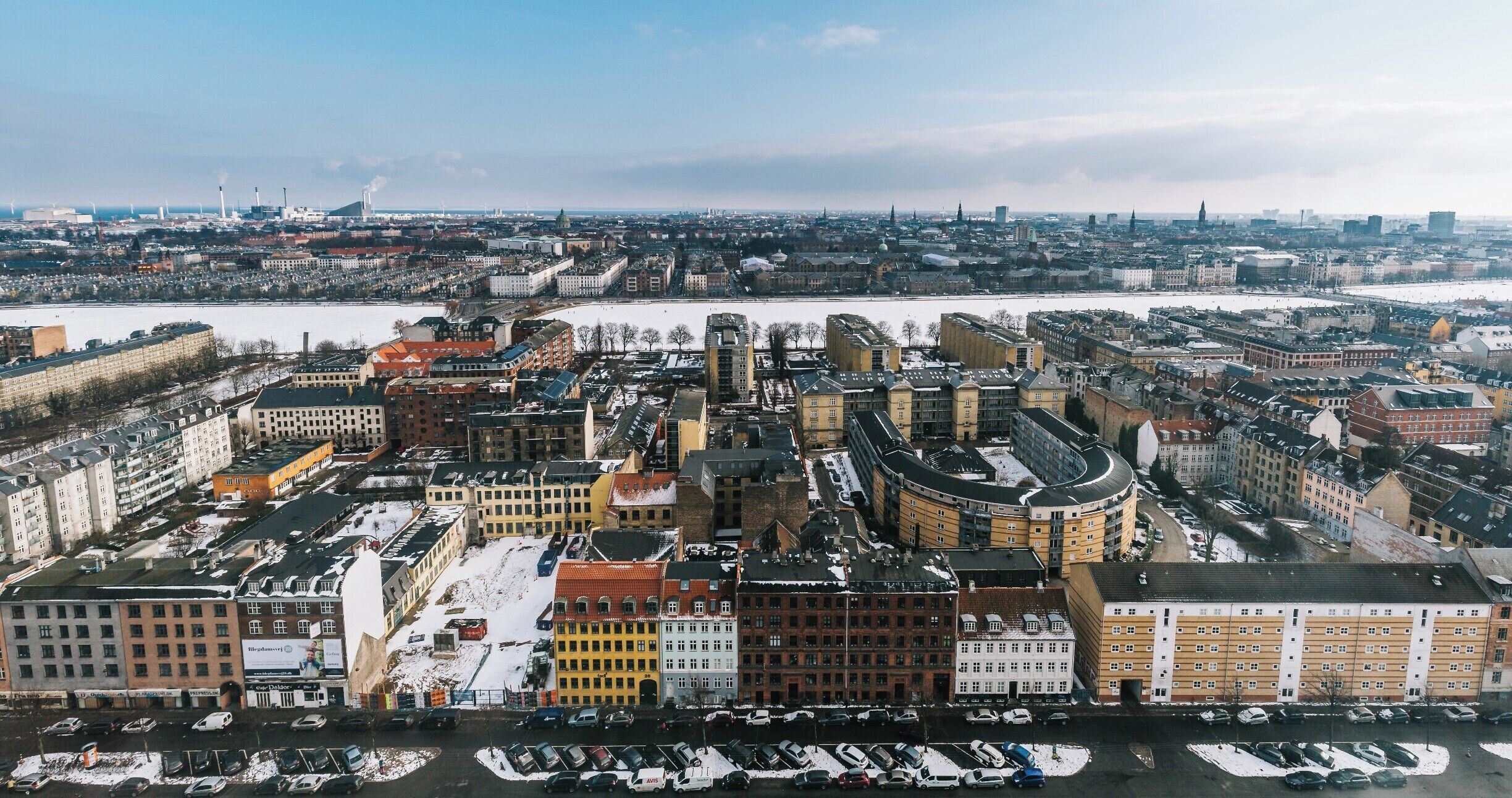 A new addition to the Copenhagen skyline, the Mærk Tower is part of the Panum Institute of the University of Copenhagen.

On weekdays between 8 and 17 there is public access to the two first floor, as well as the 15th. The view from the latter is what you see here.