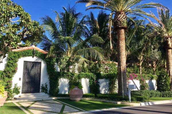 Located behind this gated wall is the home that Joseph Kennedy purchased in 1933 as a family winter home. It was here that Future President John F Kennedy wrote his inaugural address and selected his cabinet. It was also here that Joseph Kennedy had a stroke in 1961 that left him unable to speak. And, it was here that JFKs nephew William Kennedy Smith was accused and acquitted of rape in 1991. The home was sold for 4.9 Million dollars in 1995.