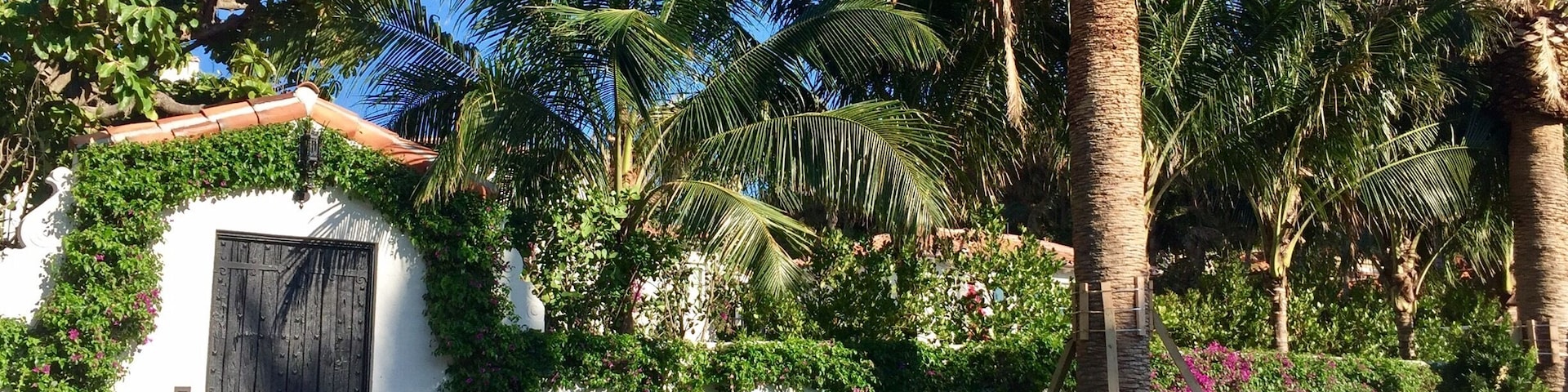 Located behind this gated wall is the home that Joseph Kennedy purchased in 1933 as a family winter home. It was here that Future President John F Kennedy wrote his inaugural address and selected his cabinet. It was also here that Joseph Kennedy had a stroke in 1961 that left him unable to speak. And, it was here that JFKs nephew William Kennedy Smith was accused and acquitted of rape in 1991.  The home was sold for 4.9 Million dollars in 1995.