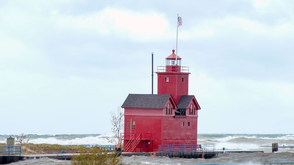 Holland Michigan Big Red lighthouse with high water level and waves