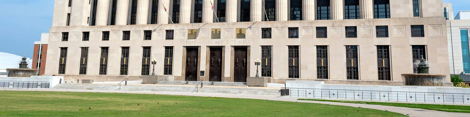 A large neoclassical building with columns and a central entrance.