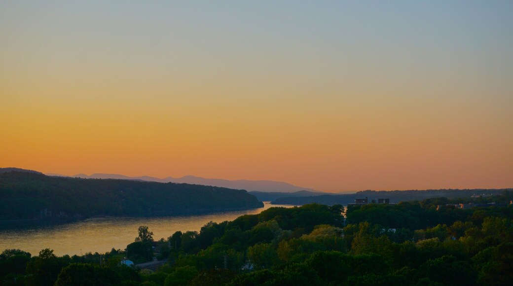 Poughkeepsie, New York: View of sunset over the Hudson River, with the Catskill Mountains in the background, from the Walkway Over the Hudson.