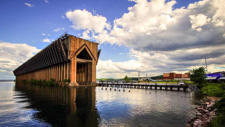 Marquette Michigan Downtown Waterfront District. Iron ore docks and Lake Superior shore of the downtown waterfront district of Marquette Michigan.