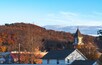Panorama fall season of American town Bradford PA setting sun natural authentic background image