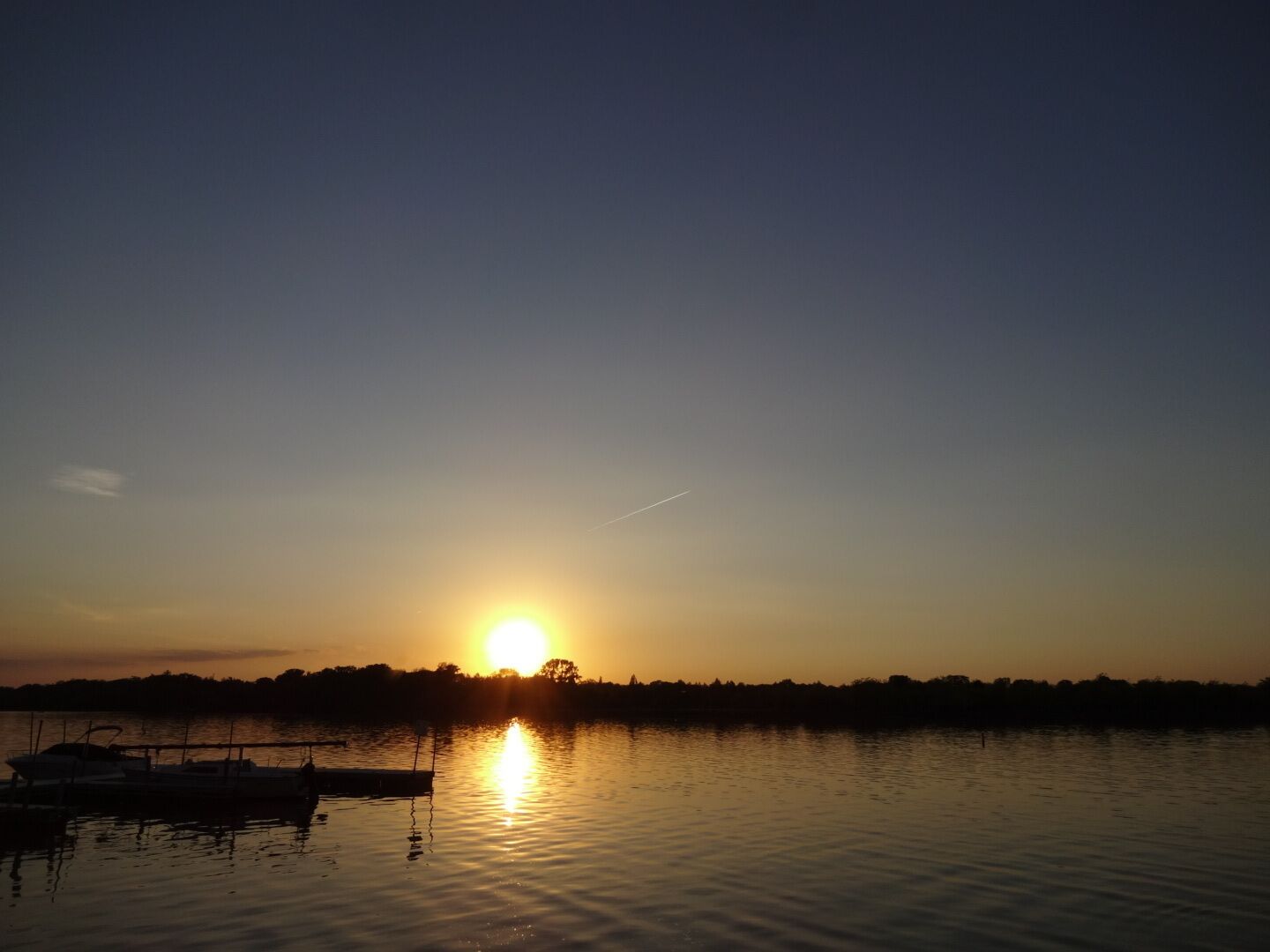 The sun setting over the calm waters of the Maumee River just down from historic downtown Perrysburg as seen from Hood Park. 

The park has a couple military monuments, a flower garden, a couple of docks and obviously a pretty nice sunset view. 

#GoldenHour