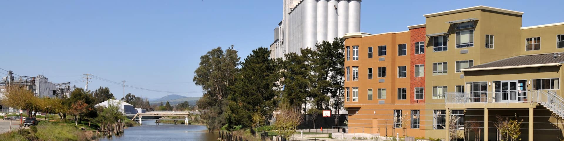 Condos and old industrial building along a canal, Petaluma, California; Shutterstock ID 10701373; Purchase Order: -