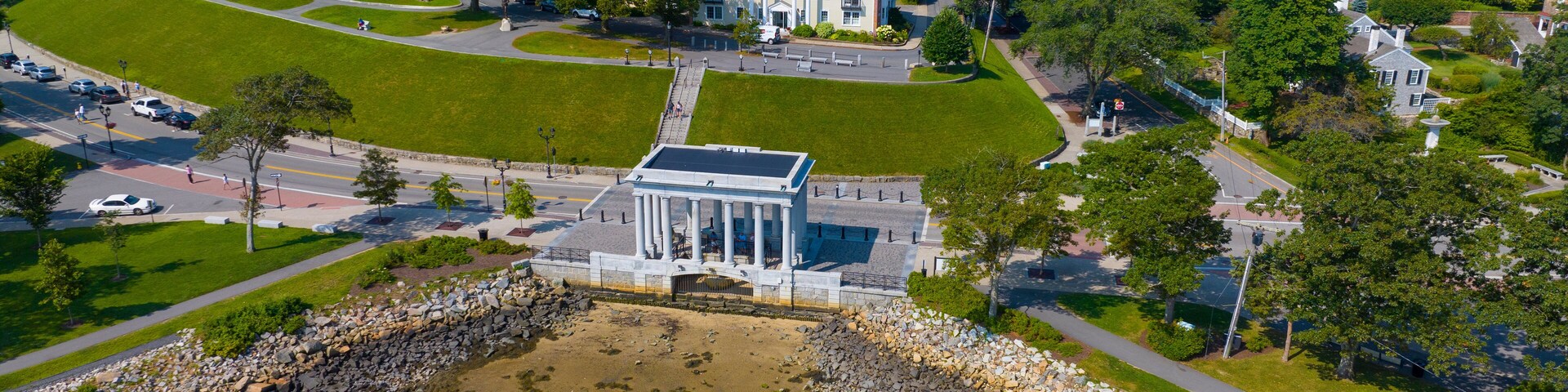 Plymouth historic town center aerial view including Plymouth Rock building on waterfront, Plymouth, Massachusetts MA, USA.