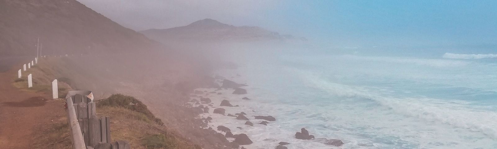 I was driving back to Cape Town after my visit to Cape Point when, after a turn, I saw this landscape. The misty atmosphere was unreal. I needed to stop the car and capture this scenario. I then discovered that for some reason the presence of mist is quite common on that cliff. I guess that's the reason it's called Misty Cliff.
#southafrica #capetown #capepoint #nature #mistycliff