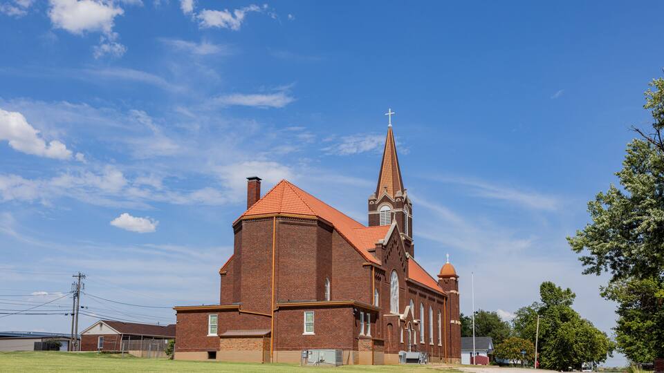 Sunny exterior view of the Saint Rose of Lima Catholic Church
