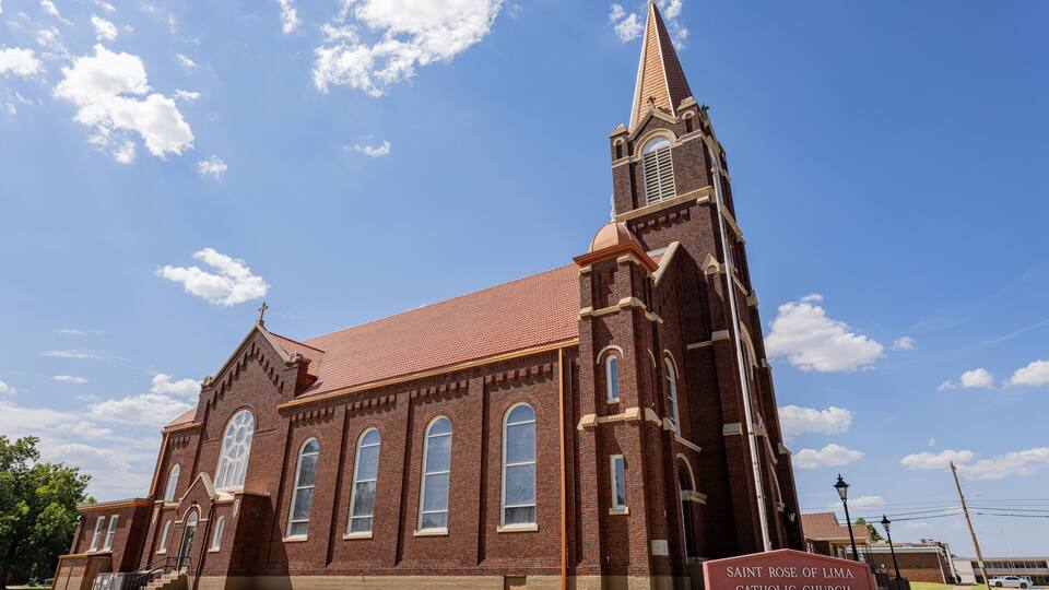 Sunny exterior view of the Saint Rose of Lima Catholic Church