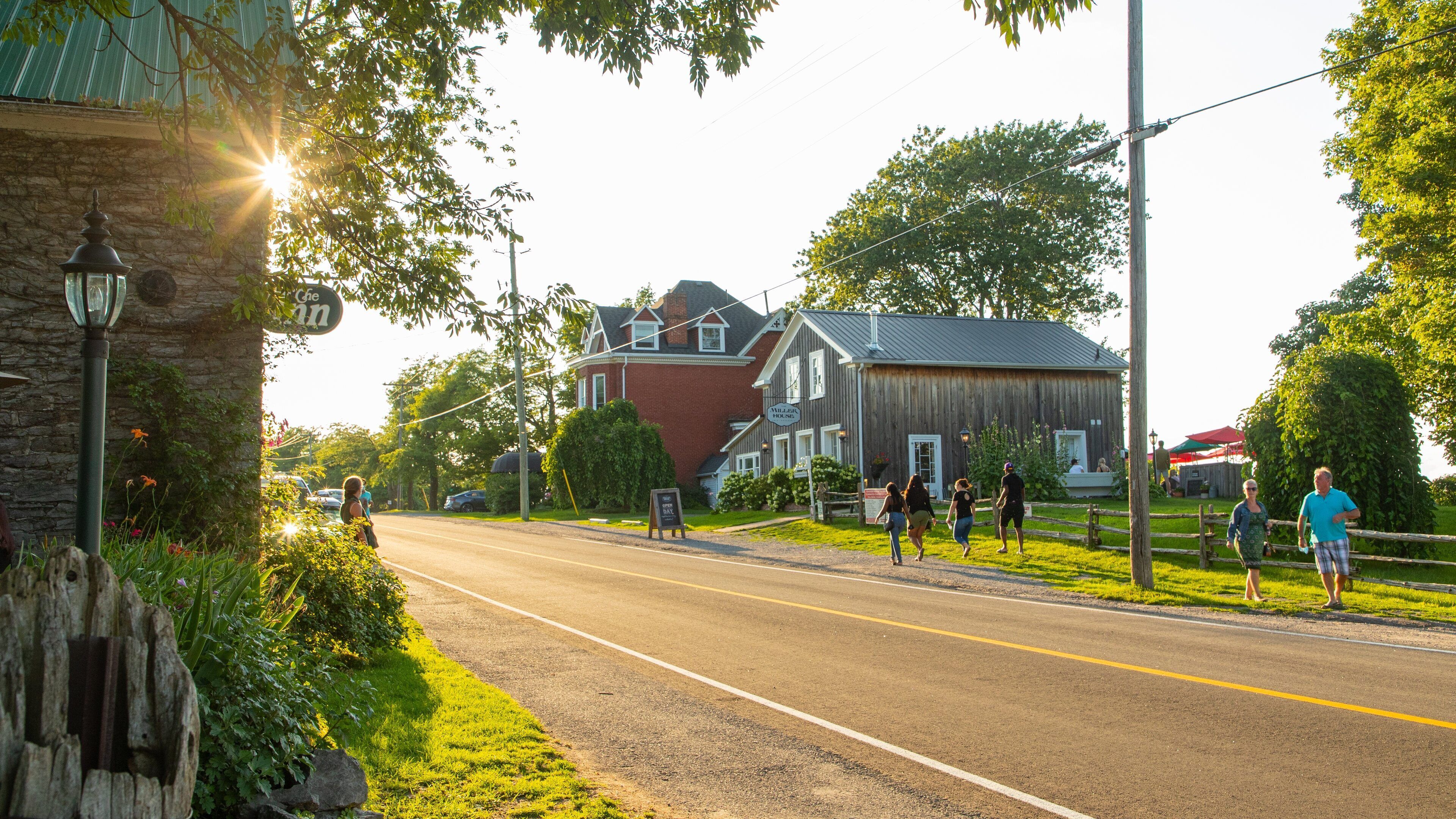 Picton featuring a small town or village, street scenes and a sunset