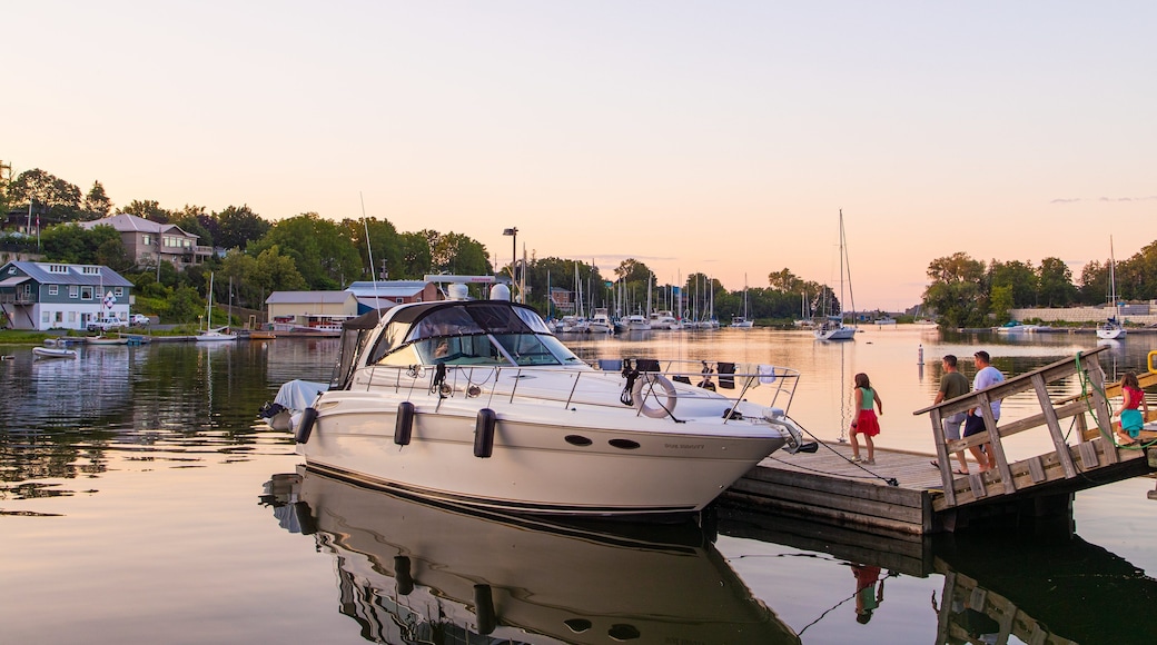 Picton showing a sunset and a bay or harbor as well as a family
