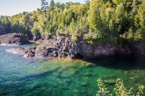 Lake Superior Cliffs. Cliffs in the Marquette Presque Isle city park is a popular cliff diving location in the Upper Peninsula of Michigan.