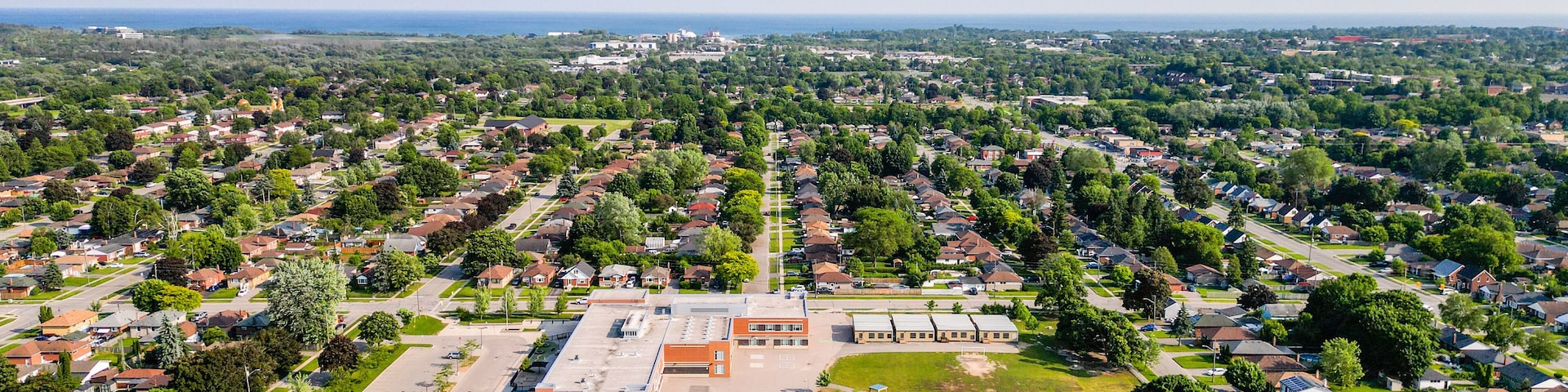 Explore Oshawa, Ontario with stunning drone photography. Capture striking aerial views of Lake Ontario, Lakeview Park, and Highway 400. Highlight Durham's real estate market, featuring exquisite homes