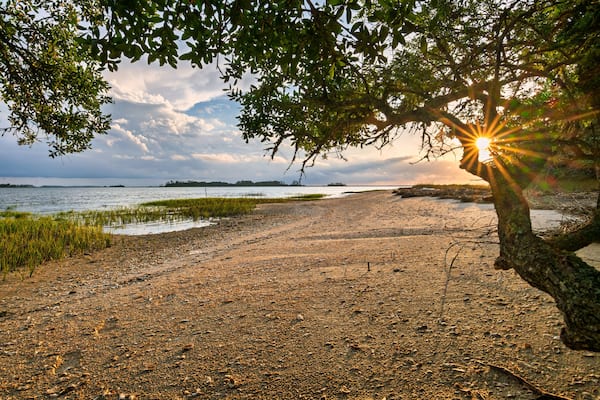 sunset with coastal landscape