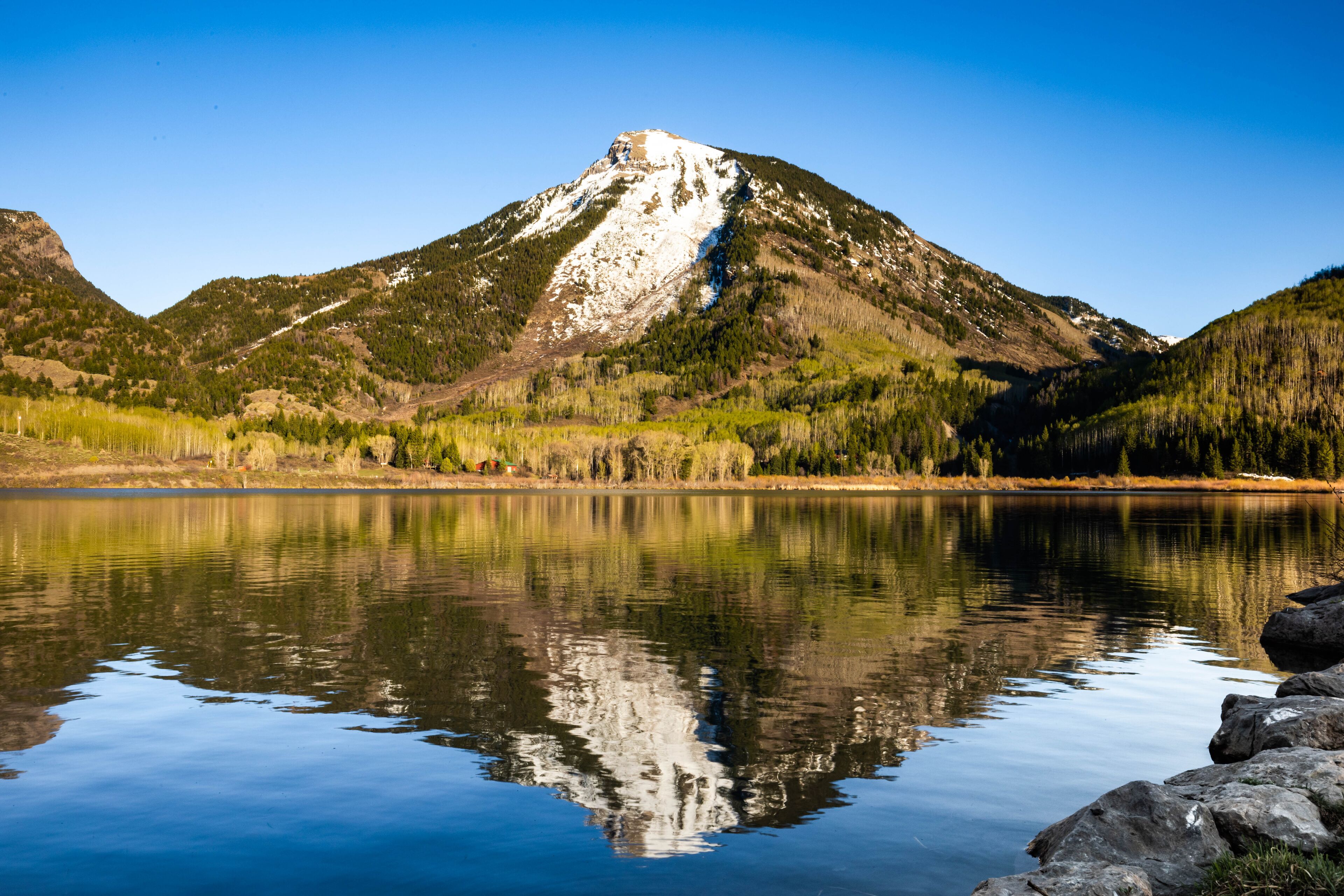 Whitehouse mountain on Beaver lake Colorado at sunset
