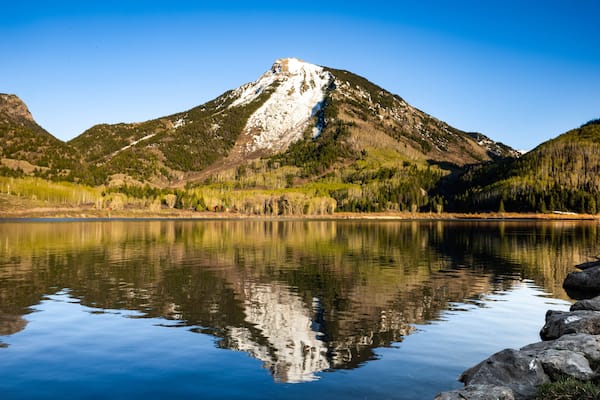 Whitehouse mountain on Beaver lake Colorado at sunset