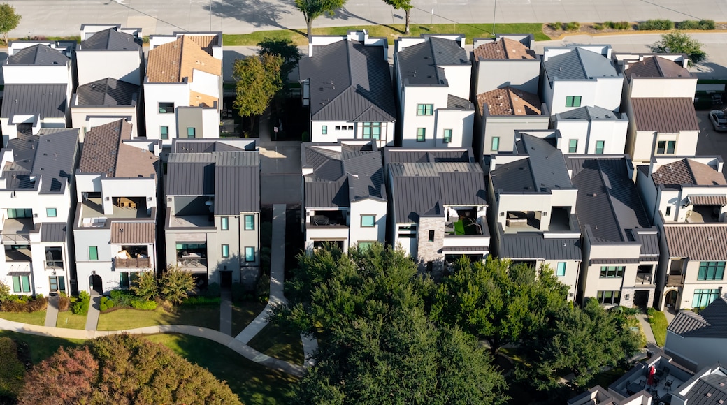 Modern suburban townhouses featuring unique architecture from above