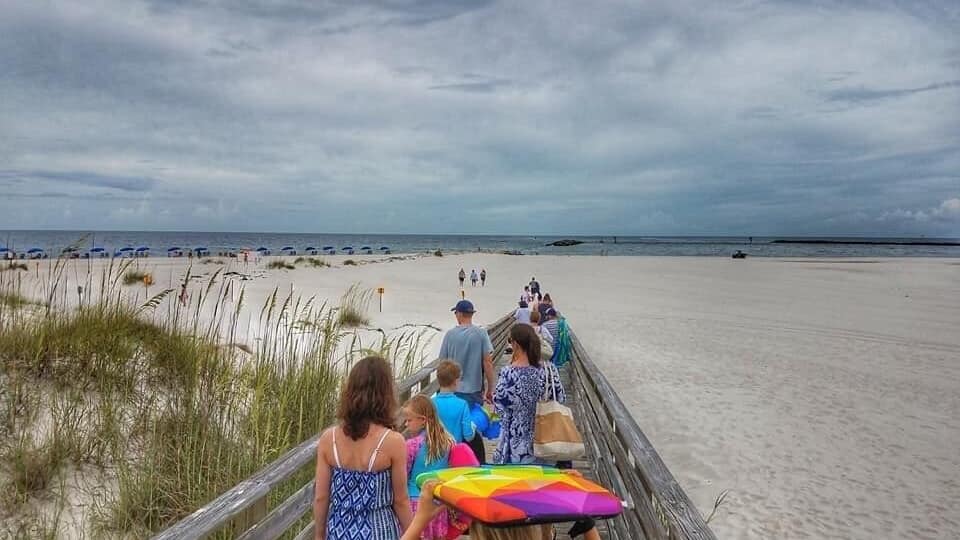Although the resort technically isn’t beach side, you merely have to take a short walk through the property before you reach this beautiful boardwalk where you’ll find calmer waters.