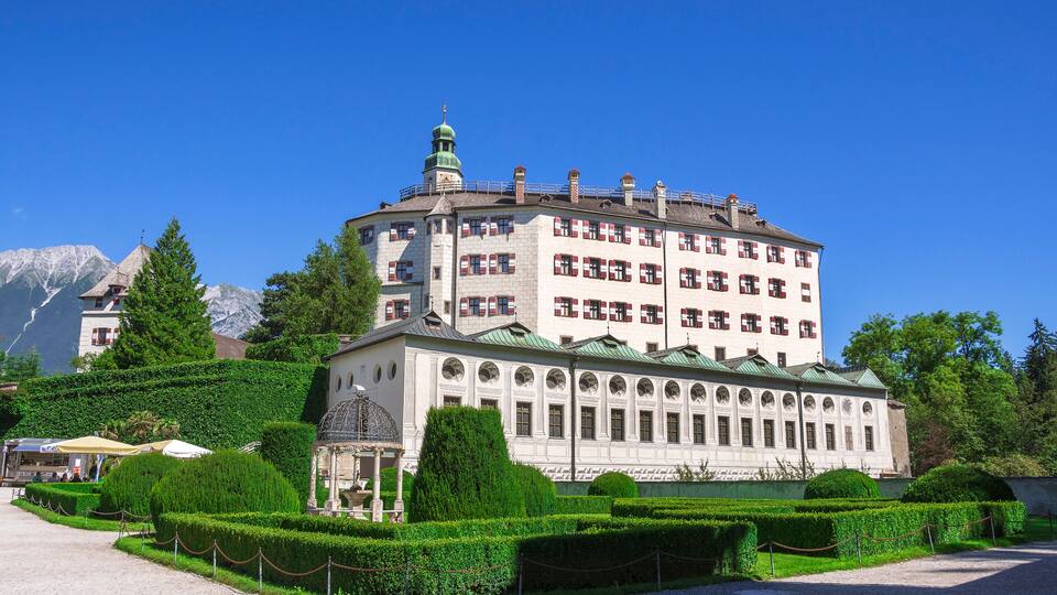 Ambras Castle and the green garden in Innsbruck ,capital of Tirol, Austria