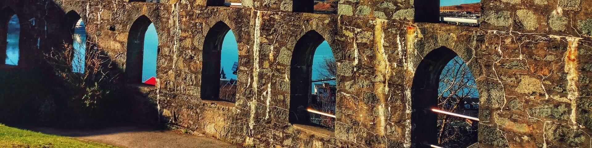 A stone aqueduct with multiple arches.