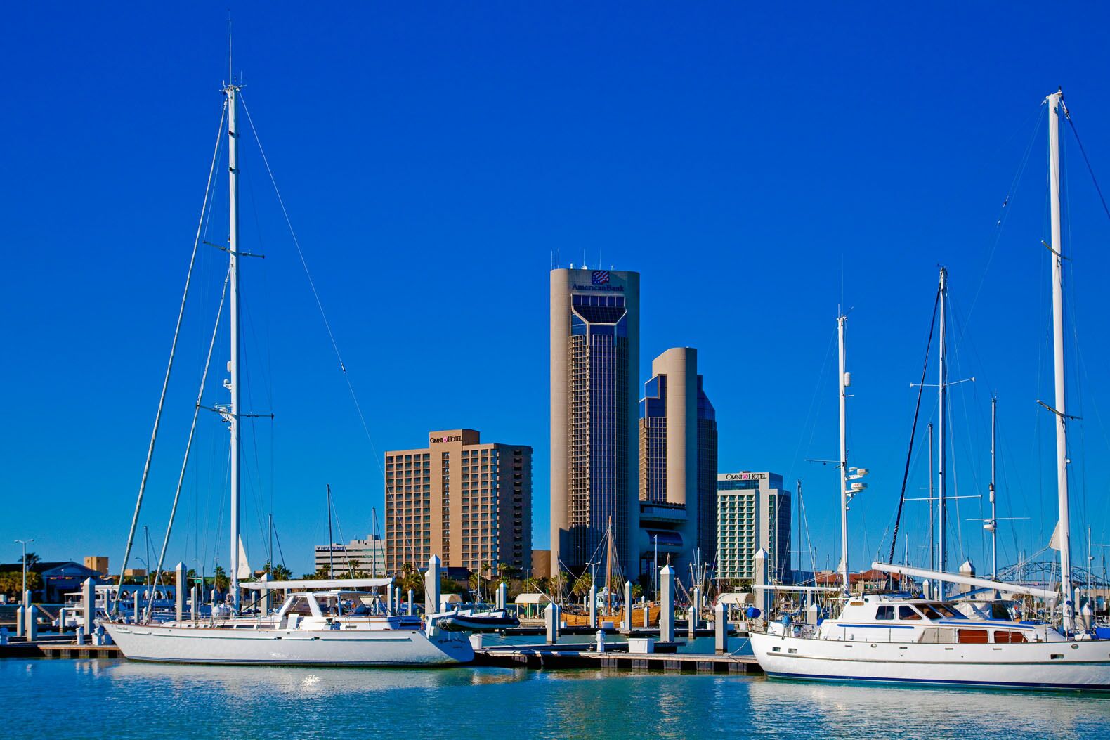Downtown Corpus Christi Texas with sailboats in foreground