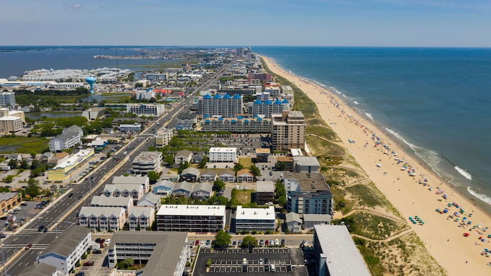 People Flock to the Beach on a 90 plus degree day in Ocean City Maryland