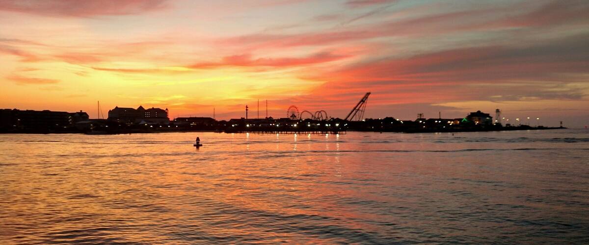 Sunrise heading out the inlet for a day of deep- sea fishing with Fin Chaser Sportfishing Charters!