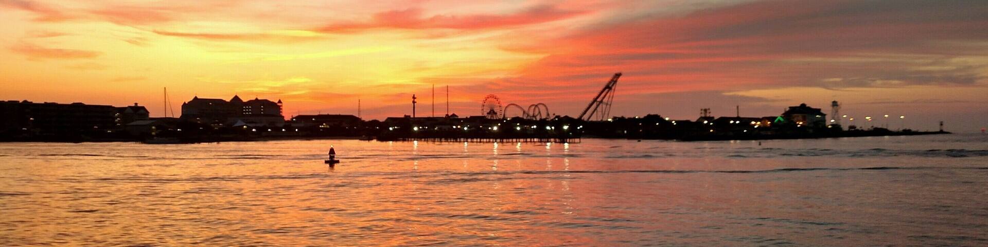 Sunrise heading out the inlet for a day of deep- sea fishing with Fin Chaser Sportfishing Charters!