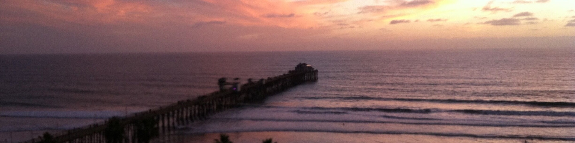 View of sunset with Oceanside pier from Wyndham resort.