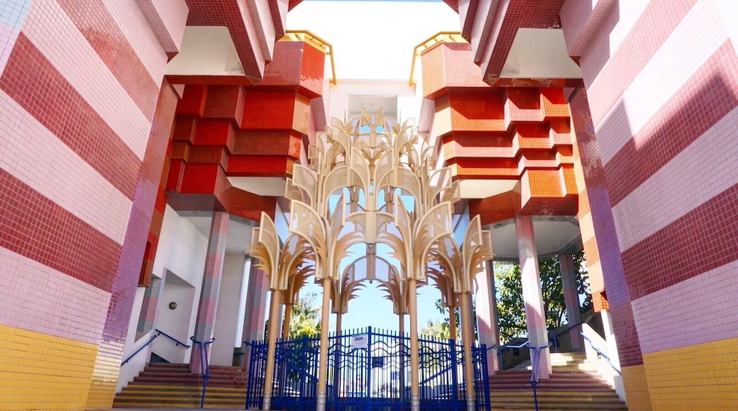 The building looks beautiful and you feel like you're in the Mediterranean, surrounded by white buildings with blue accents until you arrive at the foyer of City All and your senses are engulfed by two stories of colored tile and a beautiful golden fountain.